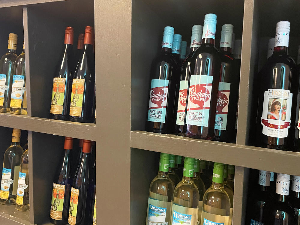 Wine selection on shelves at Hinnant Vineyards tasting room