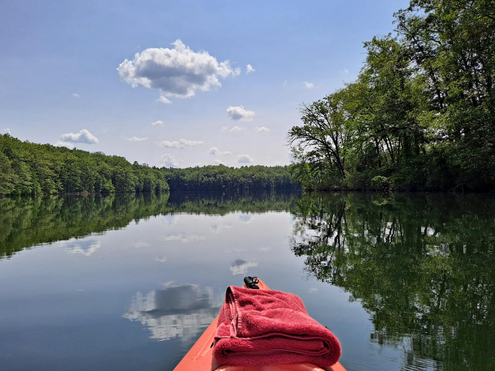 Eagle Lake is a great water area to kayak on, boasting blue water and trees lining the bank.