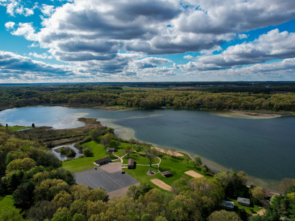 Robert Morris Park features a sandy beach, plenty of greenspace, a playground, all with gorgeous lake views.