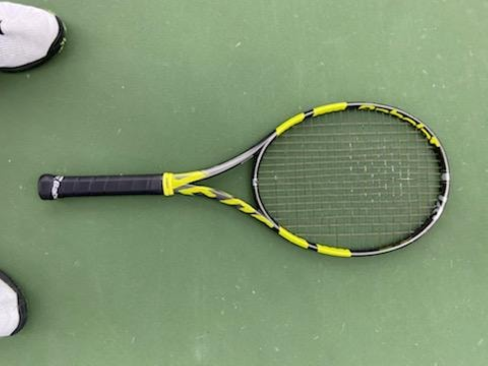 Pickleball racket on a court