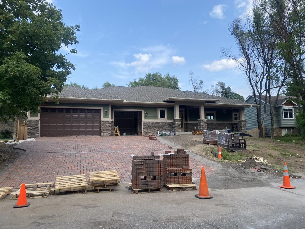 Mary Butler's home being rebuilt in Brooklyn Park, MN after a March 2025 plane crash.