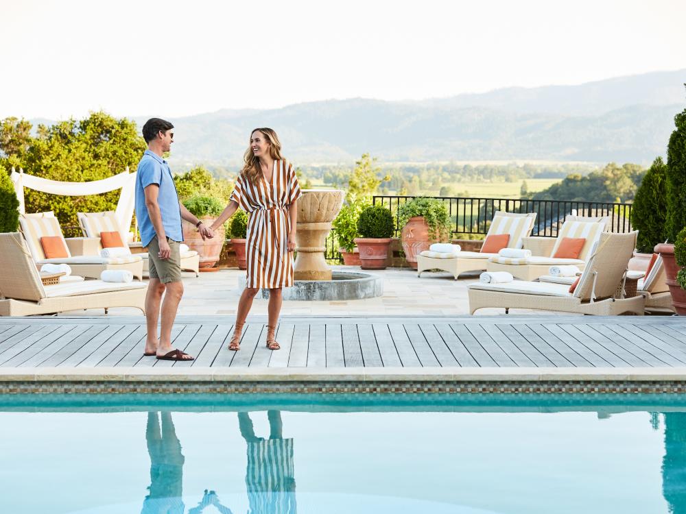 couple at the luxury pool at Auberge du Soleil
