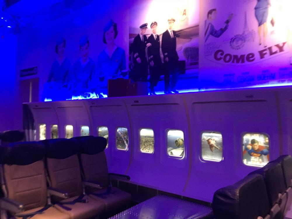 PS Air -- Glamorous posters and real airline windows with memorable views. 
