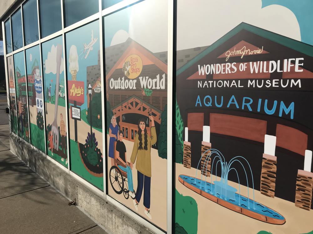 Visitor Center mural showing Wonders of Wildlife, Bass Pro, etc.