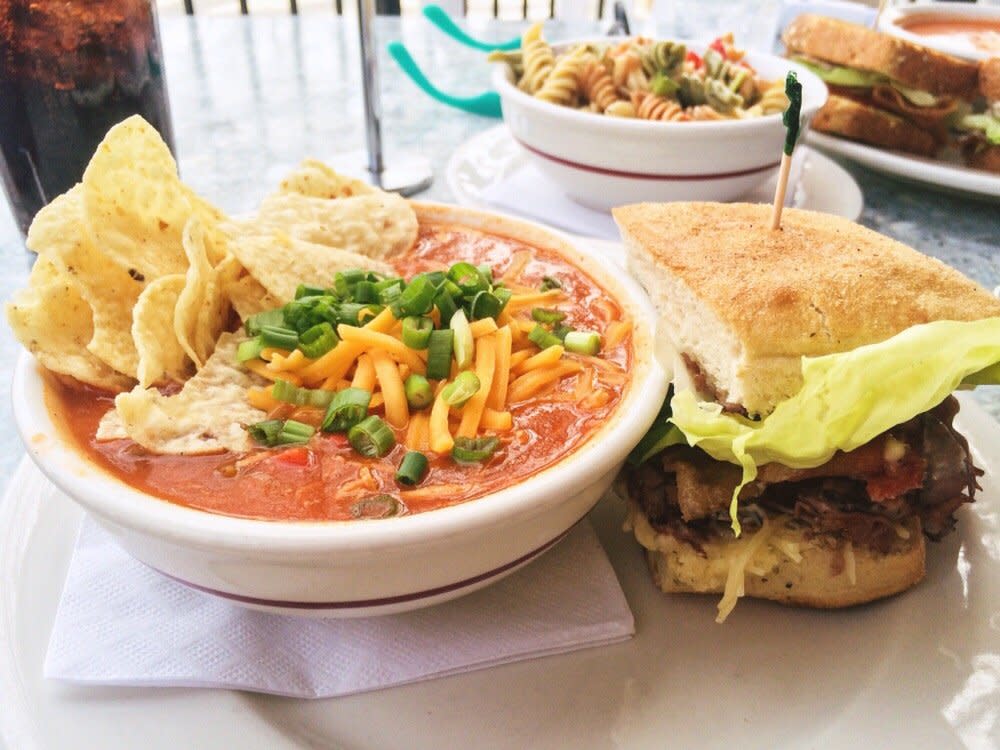 A Sandwich is served with a bowl of soup at Tanya's Soup Kitchen