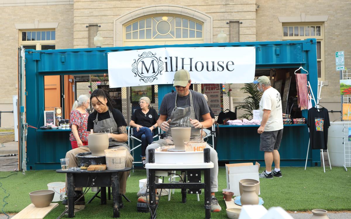 Live demonstration of hand-thrown pottery at the Live Demo area at Arts In Bloom.