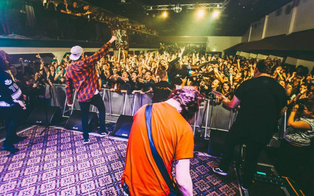 Live band playing on stage at The 1865