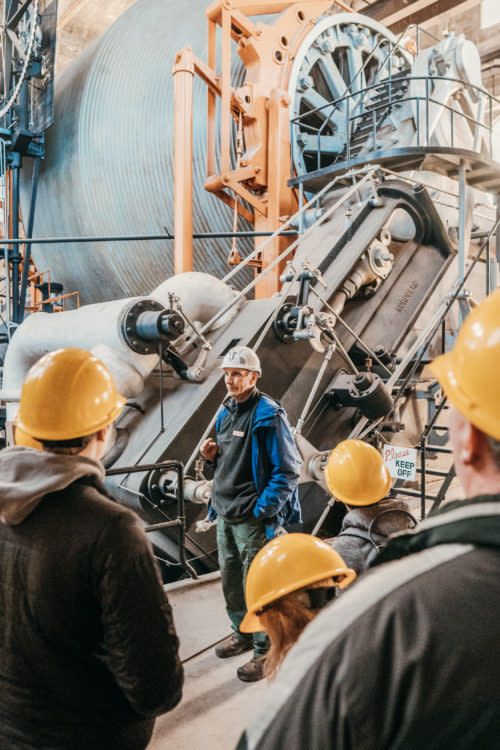 A group tour of the Nordberg Steam Hoist at the Quincy Mine