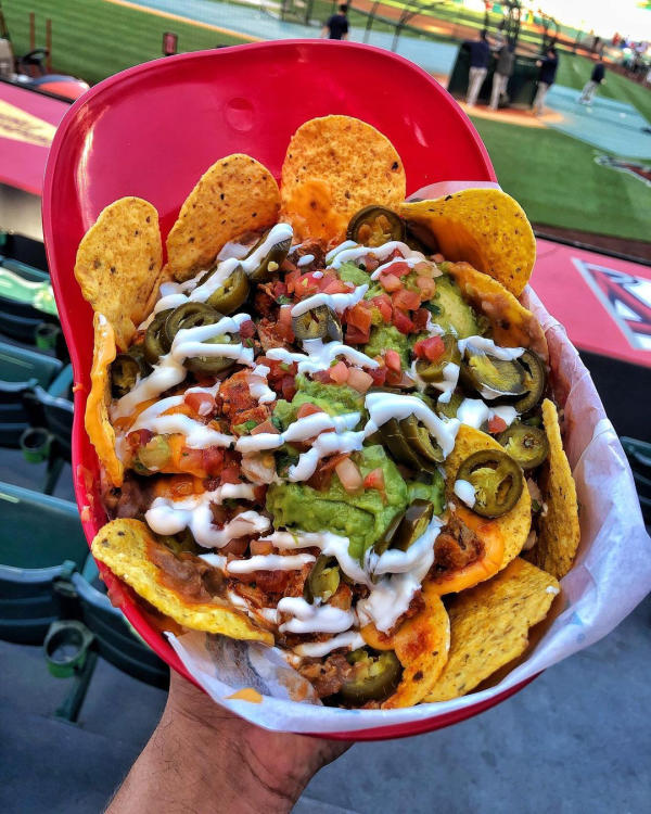 Image of nachos placed in an Angels souvenir helmet.