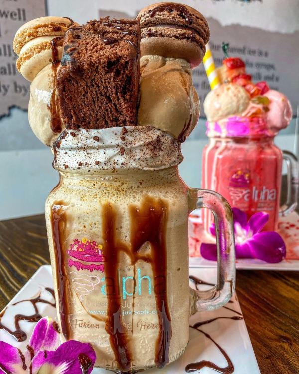 Brownie and Strawberry Dessert Shakes in Mason Jars at Alpha Dessert Juice Cafe