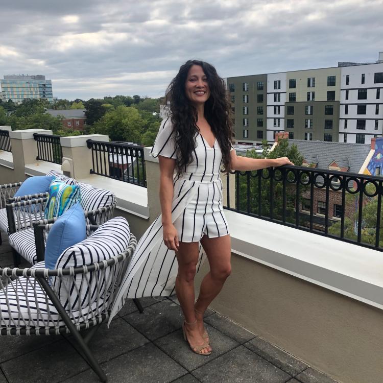 Chela on the balcony of Graduate Hotel Presidential Suite