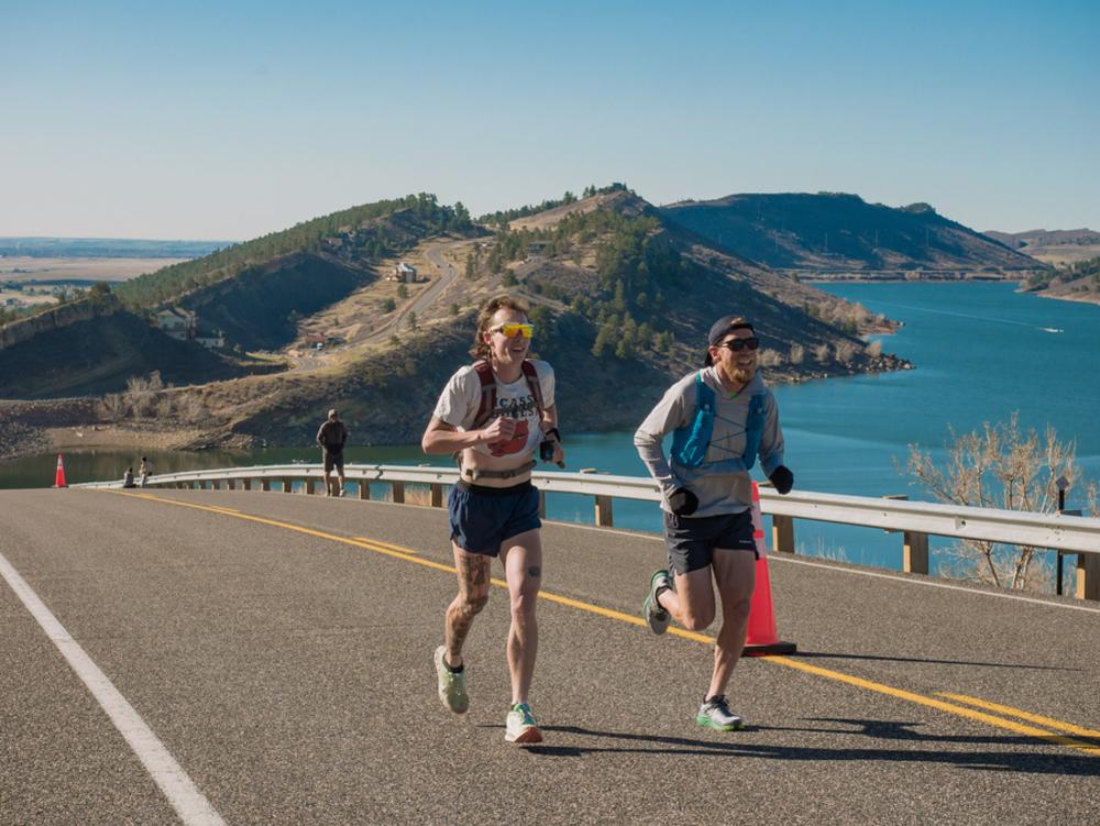 Two runners participate in the Horsetooth Half Marathon