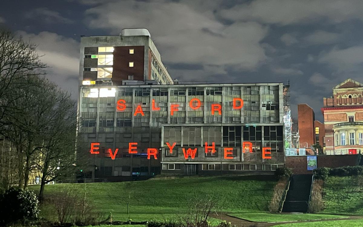 Building with writing on for Salford Everywhere celebrating 100 years of Salford