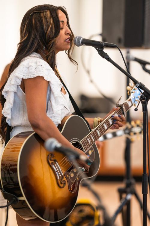 Woman With Guitar Singing At Ladybug Music Festival In Wilmington, DE