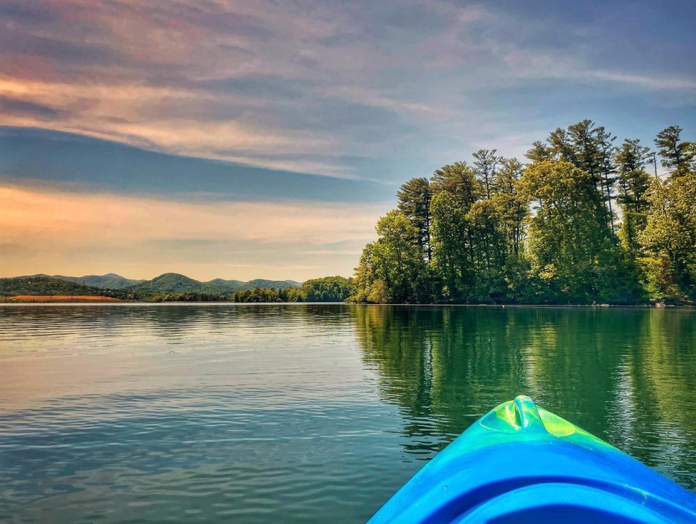 A kayak situated on Lake Julian during sunset