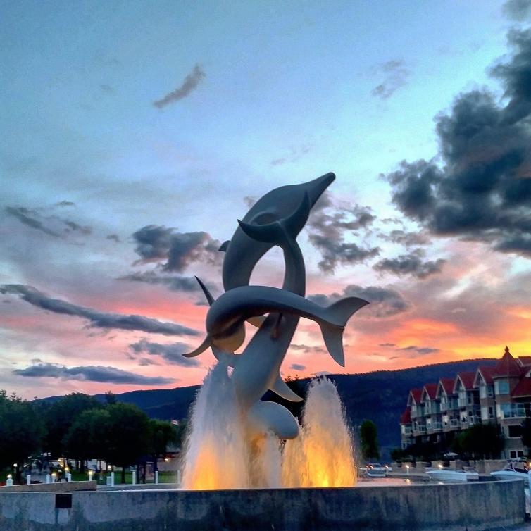 Sunset Dolphin Statue
