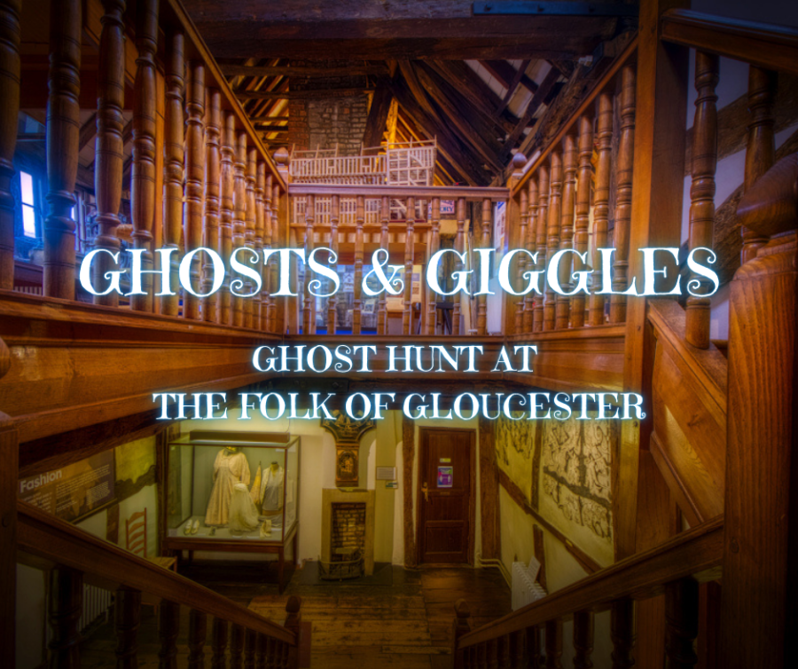 Historic timber-framed interior promoting a ghost hunt event at The Folk of Gloucester in the Cotswolds, featuring a grand wooden staircase and balcony.