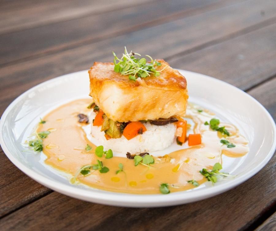 Sea Bass over sticky rice with a miso buerre blanc sauce