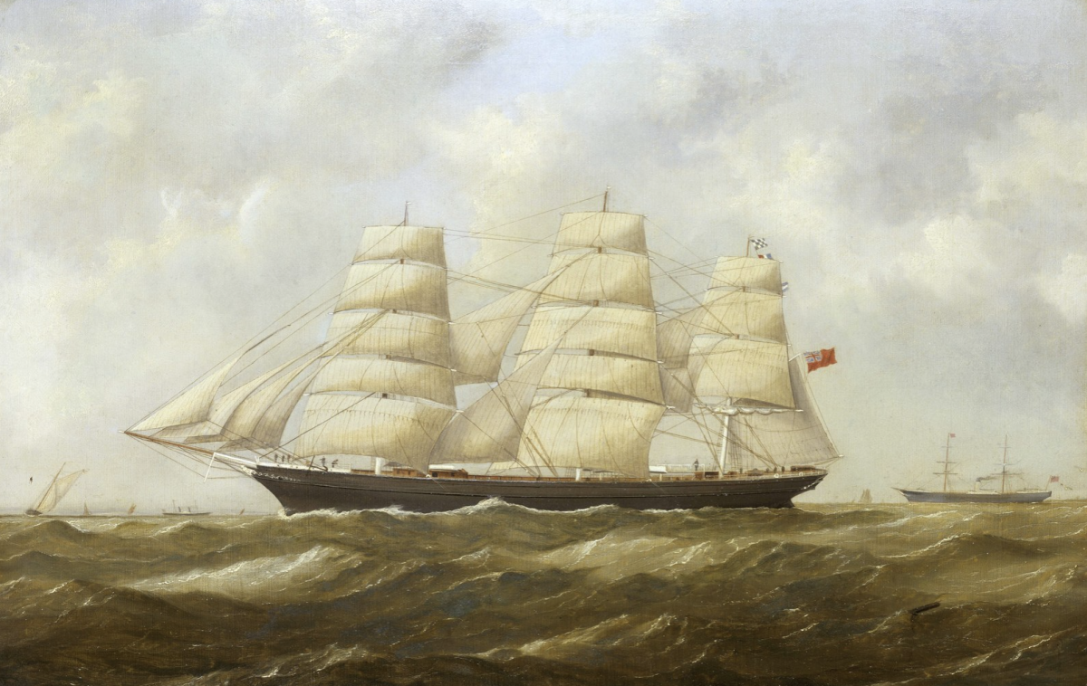 A majestic clipper ship with towering cream-coloured sails glides through choppy seas under a cloudy sky. A second ship is visible in the distance.