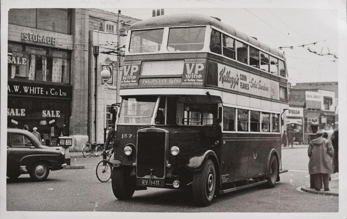 A black and white picture of a Portsmouth Corporation bus.