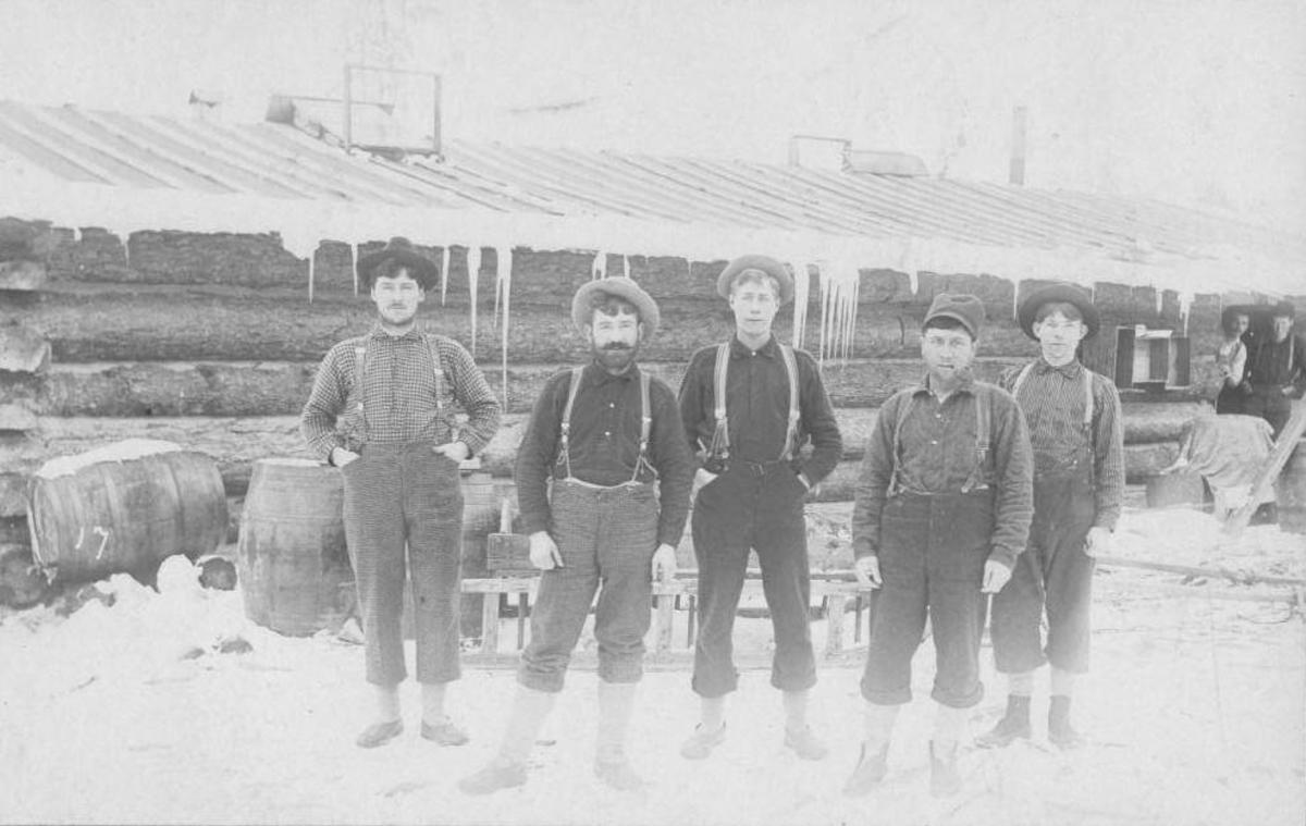 5 Men Outside Of Browns Logging Camp In The Early 1900s