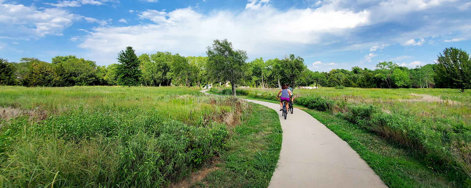 Cyclists on the Path at Swanson Park Wichita