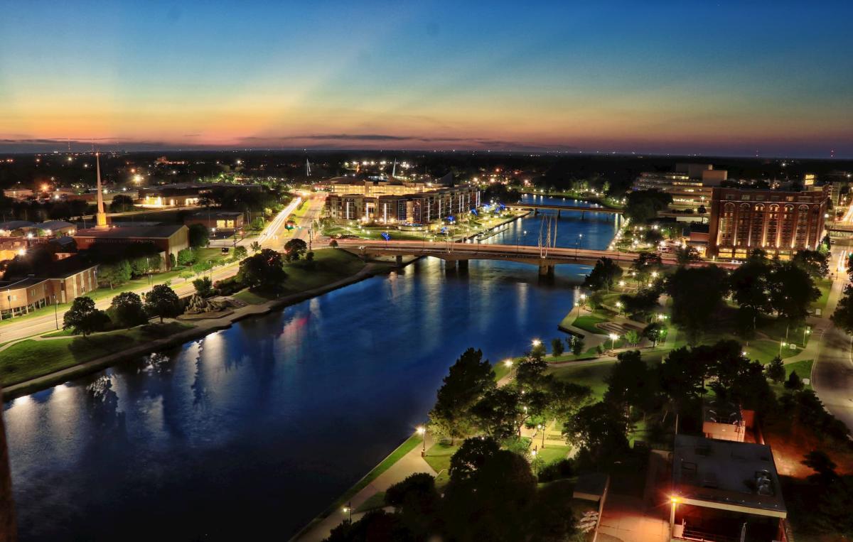Downtown shot of Wichita KS showing river and east and west bank development