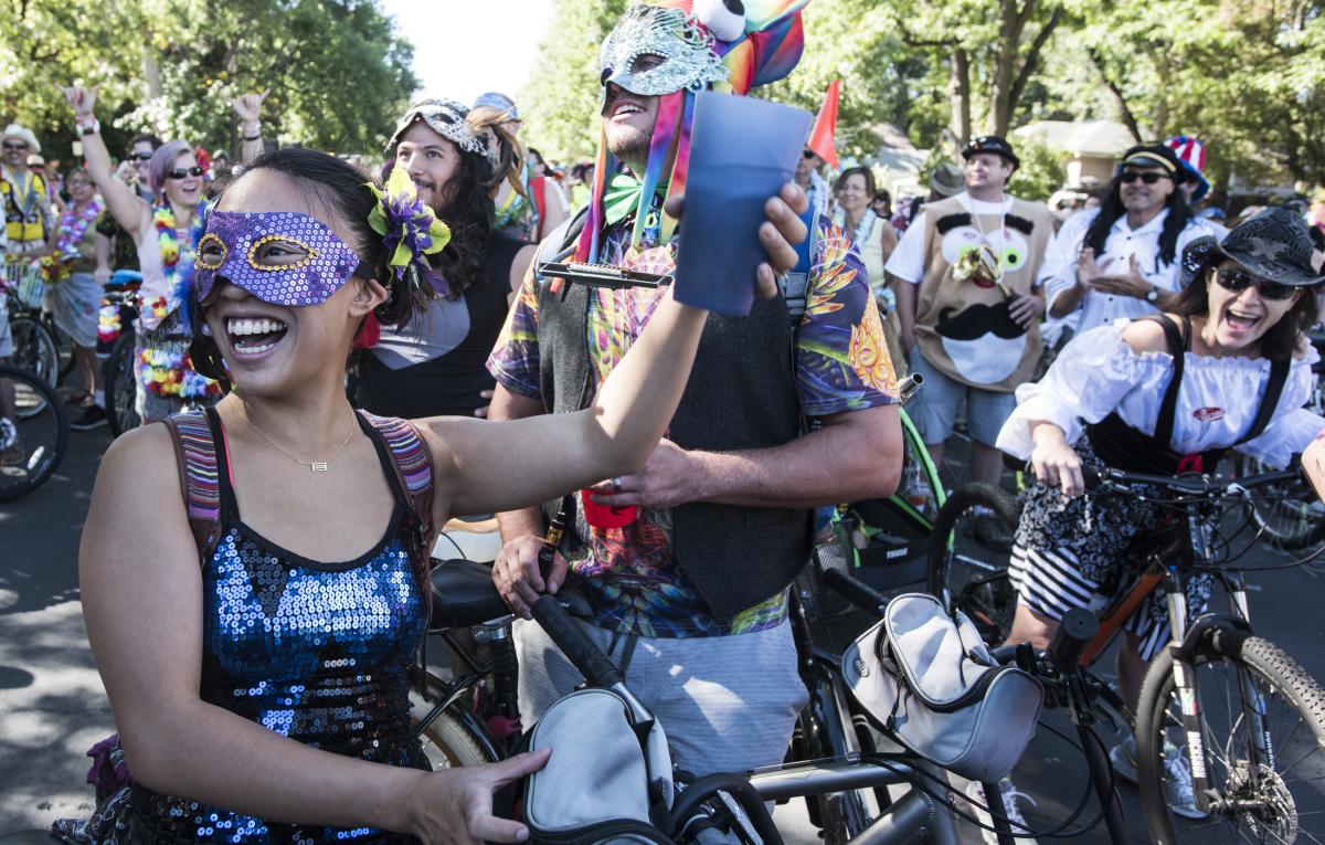 A crowd rides bikes at the annual Tour de Fat Event at New Belgium Brewery