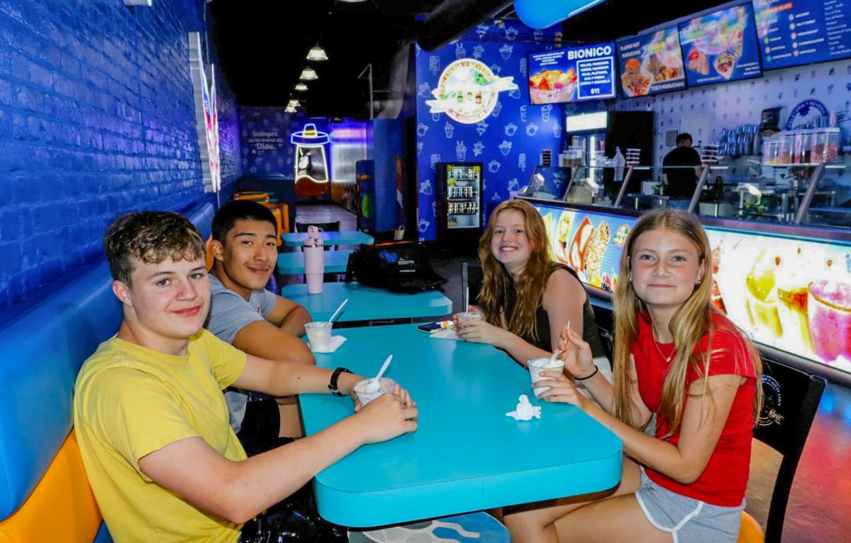 A group of teenagers having ice cream at Tipico Helado.