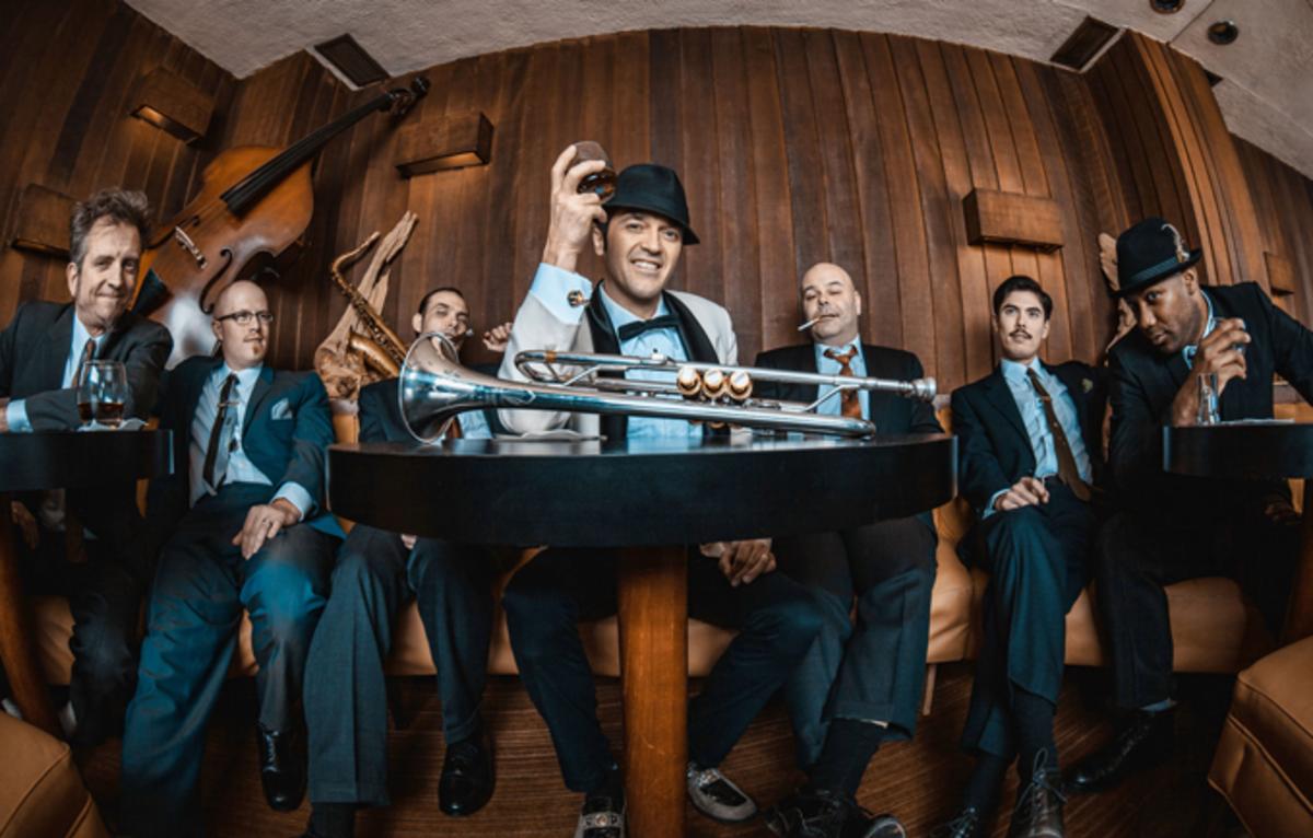 Cherry Poppin’ Daddies all sitting.