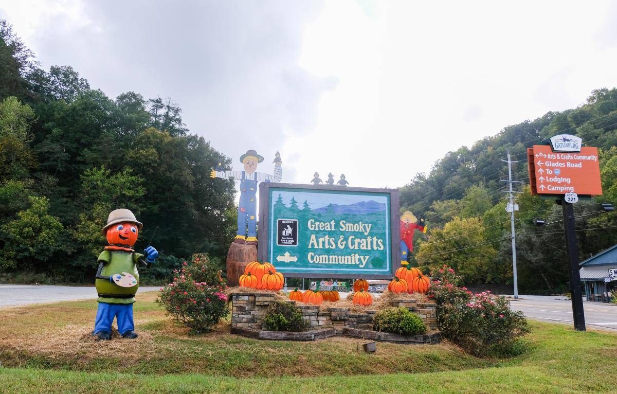 Arts & Crafts Community sign in fall