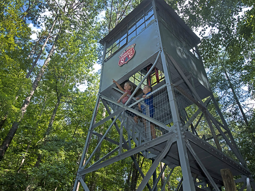 Clemmons State Forest fire tower with children, Clayton NC.