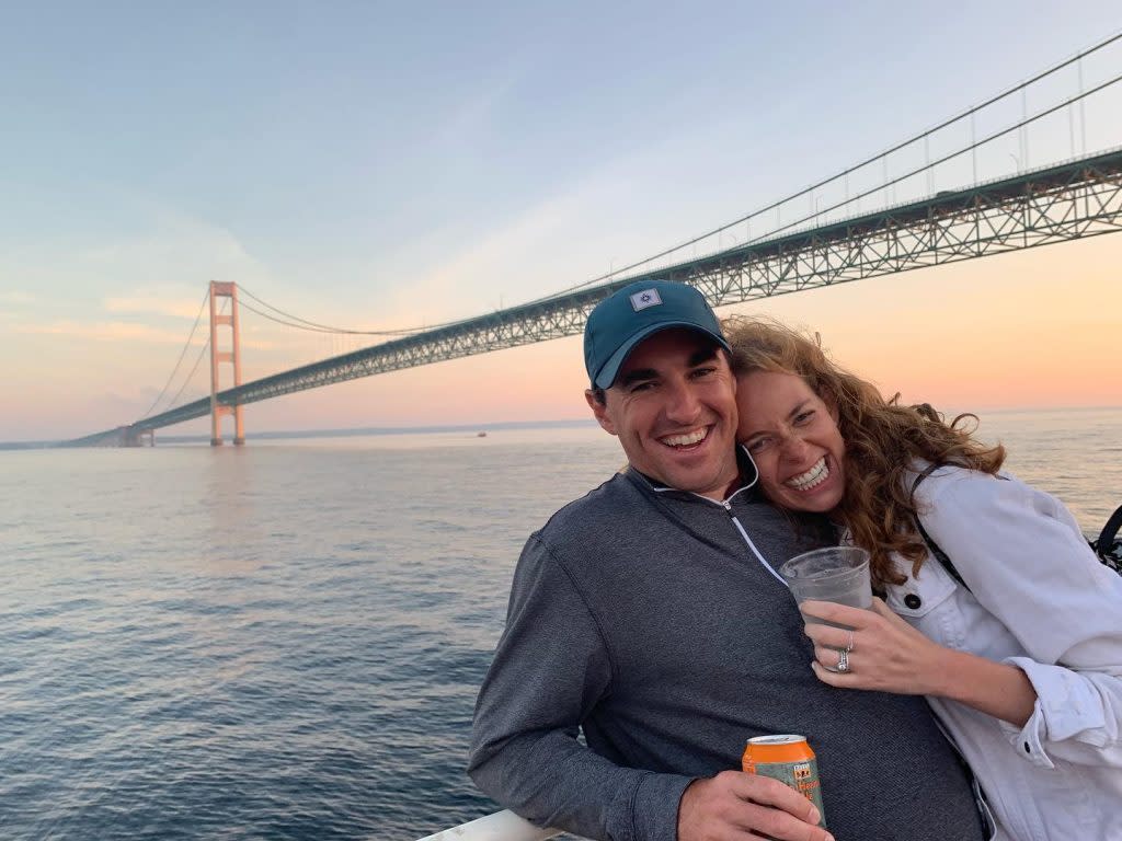 Couple Posing for Photo During Sip n’ Sail Cruise Off Mackinac Island