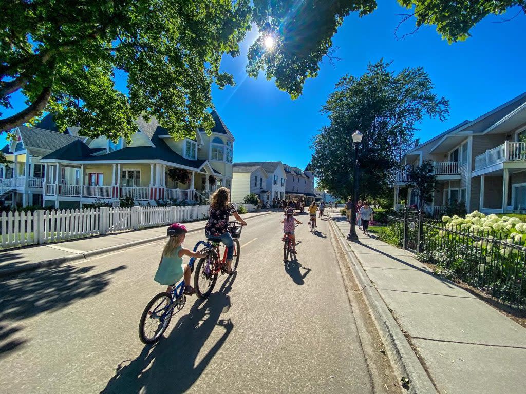A family bike ride on Mackinac Island is one of many enjoyable ways parents and kids can get outside together and be active.