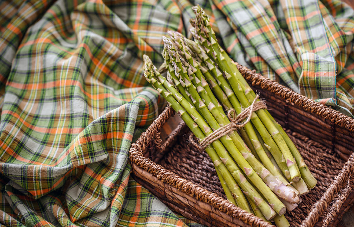 green asparagus in basket