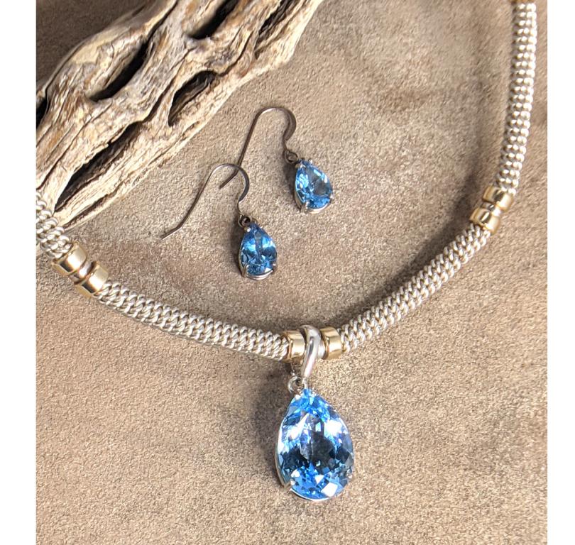 Hand-braided Silver necklace and Blue Topaz