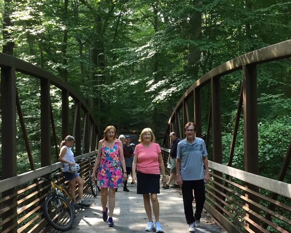 Crossing one of the bridges over a creek in Alapocas Run State Park.