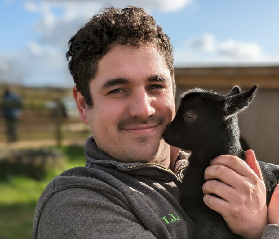Liam with a baby goat