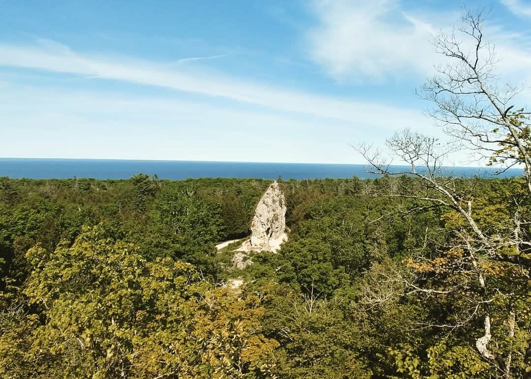 Sugar Loaf rock formation seen from a distance inside Mackinac Island State Park
