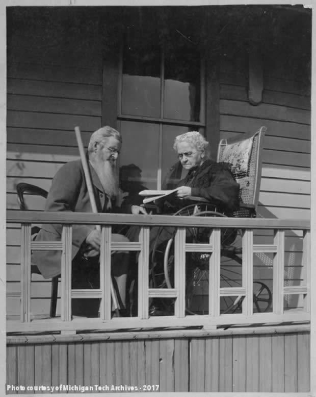 Lucena and Daniel Brockway sitting on their porch in later life