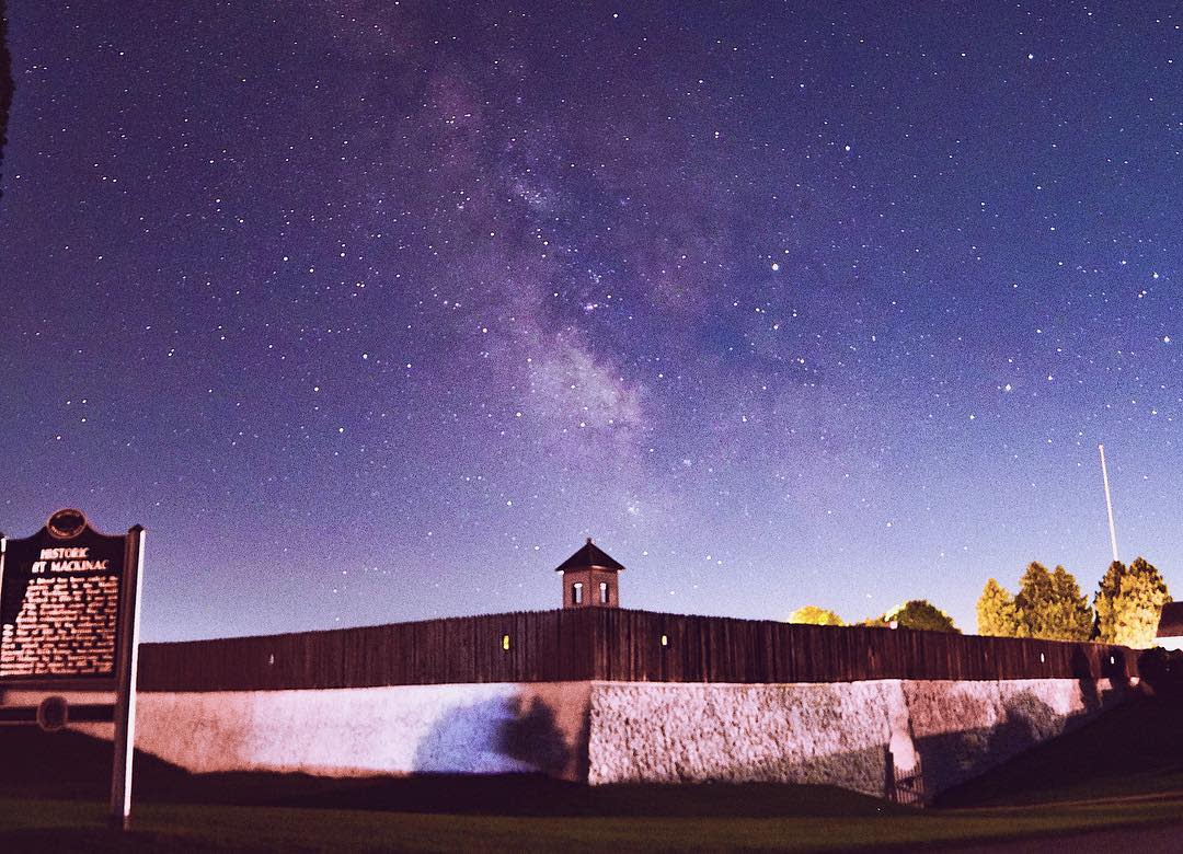 The Milky Way galaxy is visible in the night sky above Mackinac Island’s Fort Mackinac