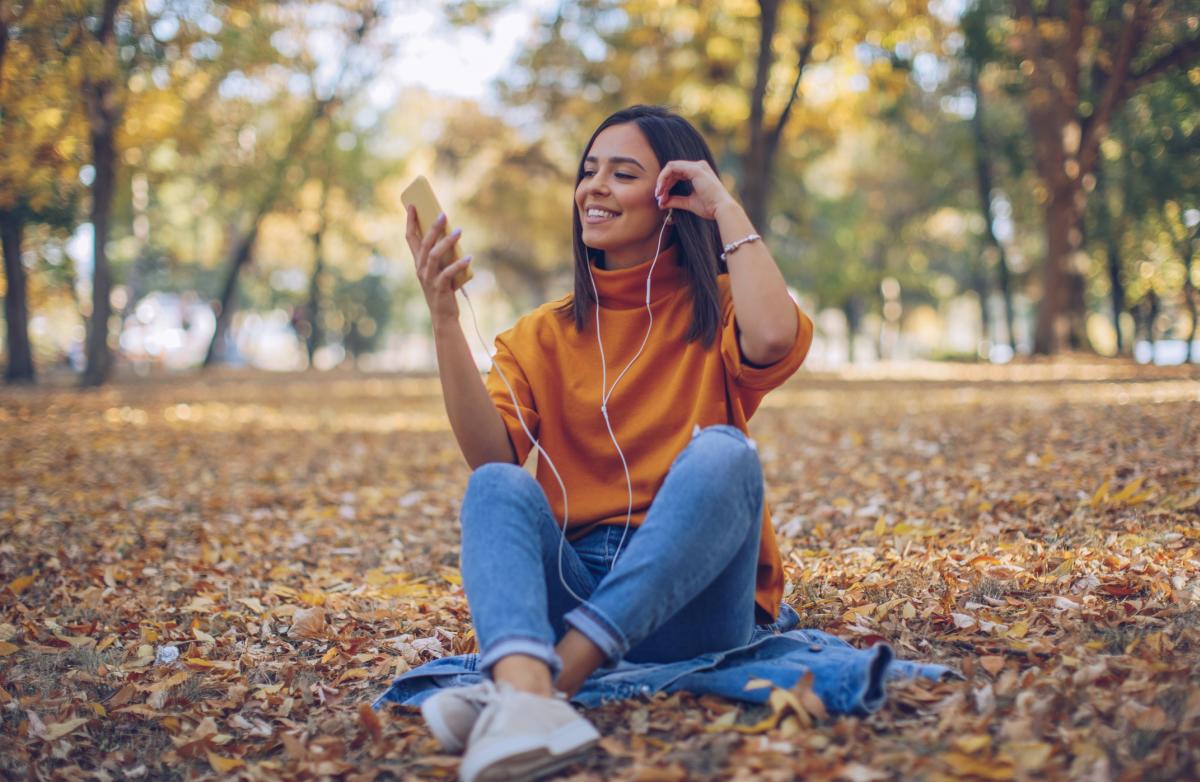 Woman in forrest on her phone