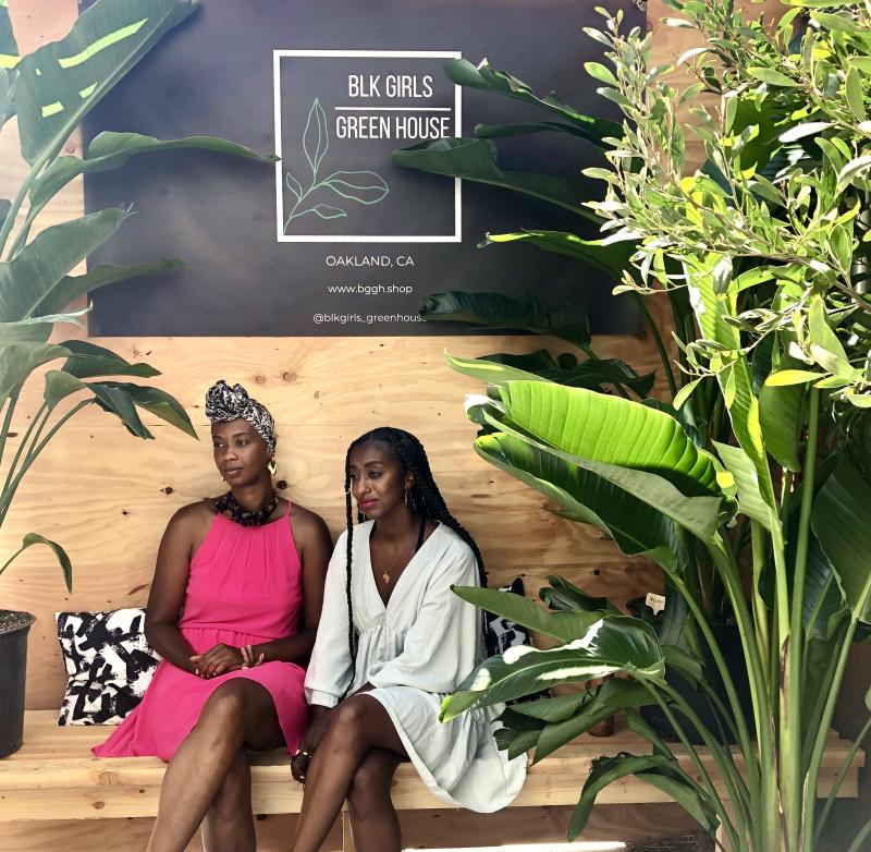 Business owners Kalkidan Gebreyohannes and J’Maica Roxanne enjoy their handiwork at Black Girls Greenhouse.