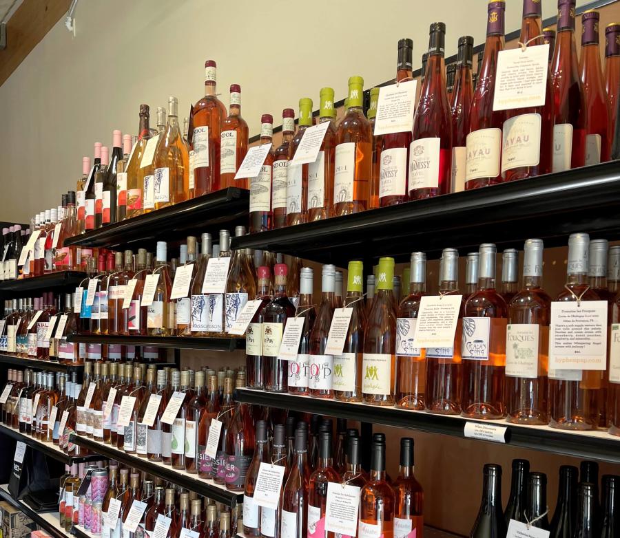 hyphen interior with wine bottles on shelf
