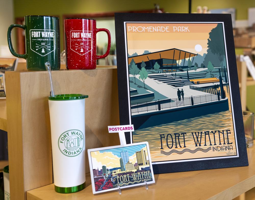 Fort Wayne camping mugs, water bottle, postcards, and poster at the Visitors Center