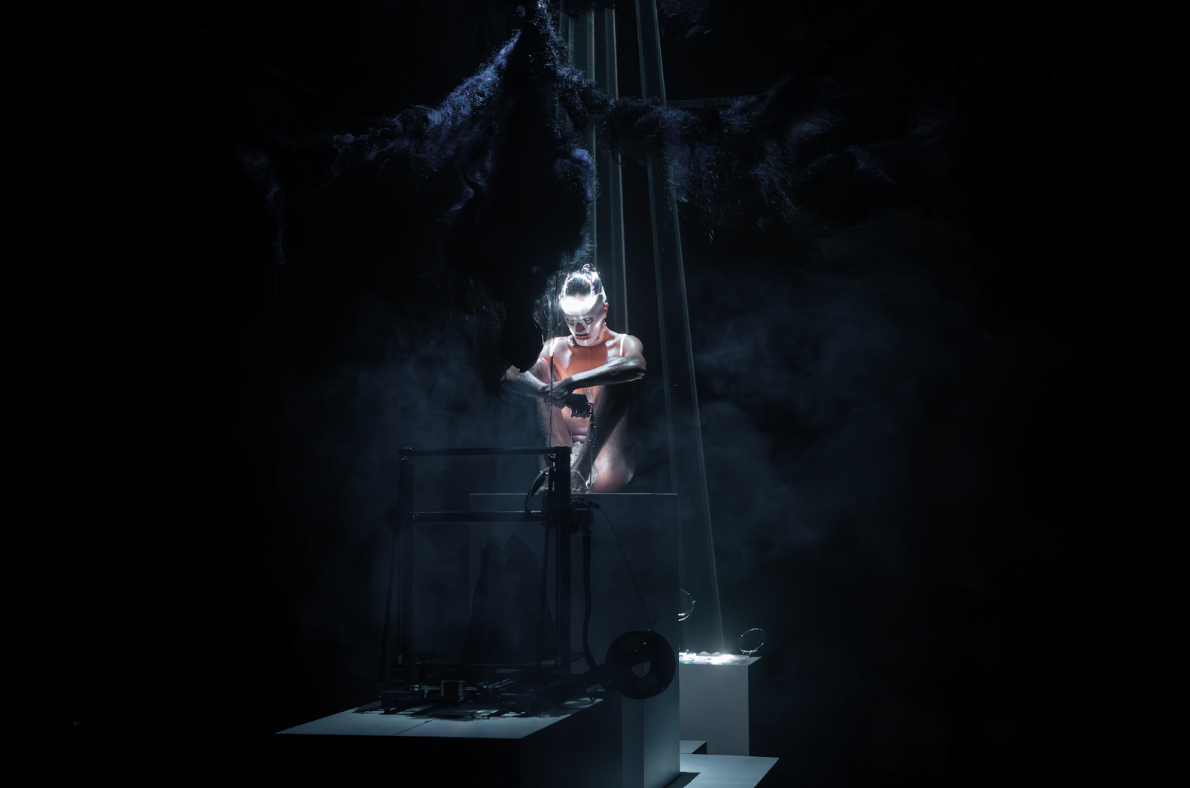 A person interacting with a light immersion exhibit IGNITE Broward 2026