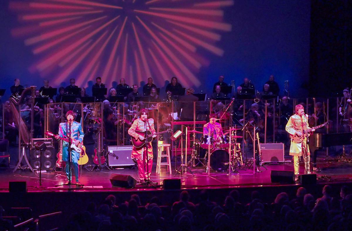 The Beatles Tribute Band and Houston Symphony performing at The Cynthia Woods Mitchell Pavilion