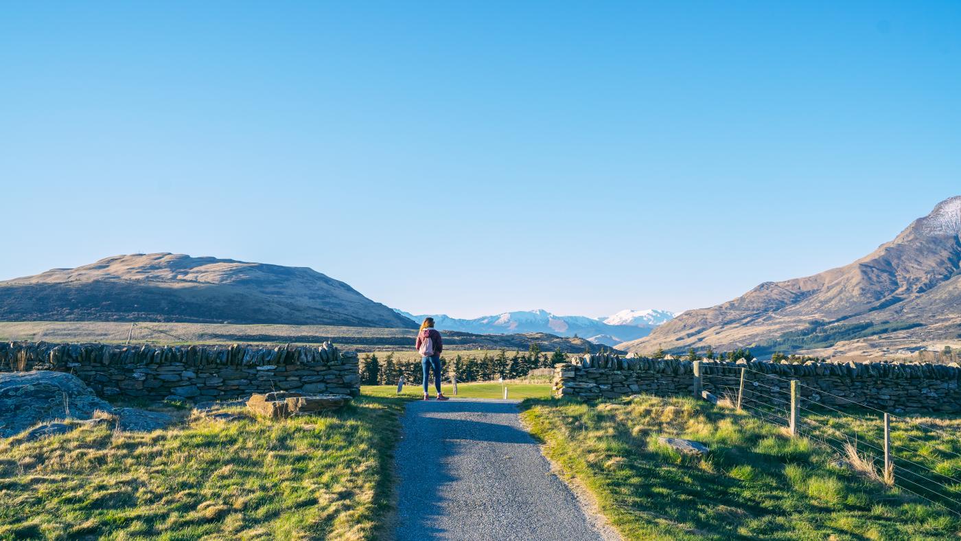 Woman taking a spring walk around Jacks Point