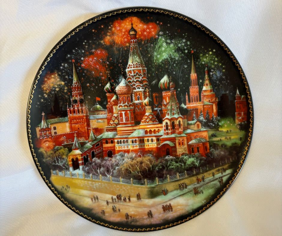 Photo of a decorative lacquer plate featuring Russia's iconic St. Basil's cathedral.