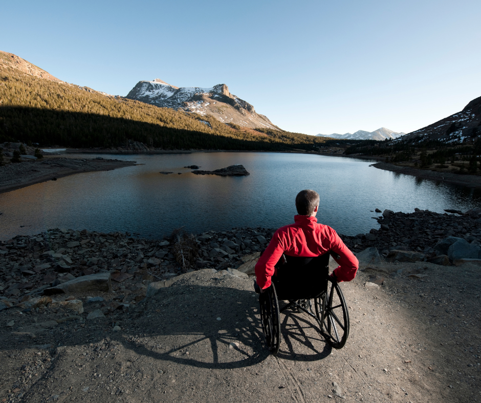Solo Travel - Man in wheel chair at a lake - Accessible travel